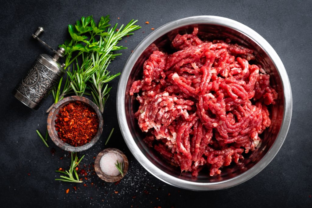 Mince. Ground meat with ingredients for cooking